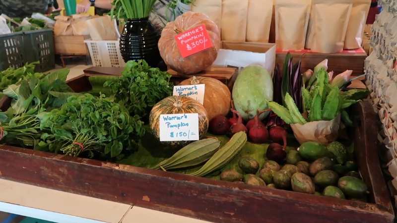 A Wooden Display at Bollywood Veggies Showcases Fresh Produce