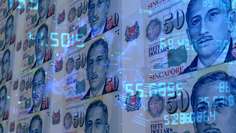 Singapore dollar banknotes with digital overlays illustrate financial and profitability factors in Singapore